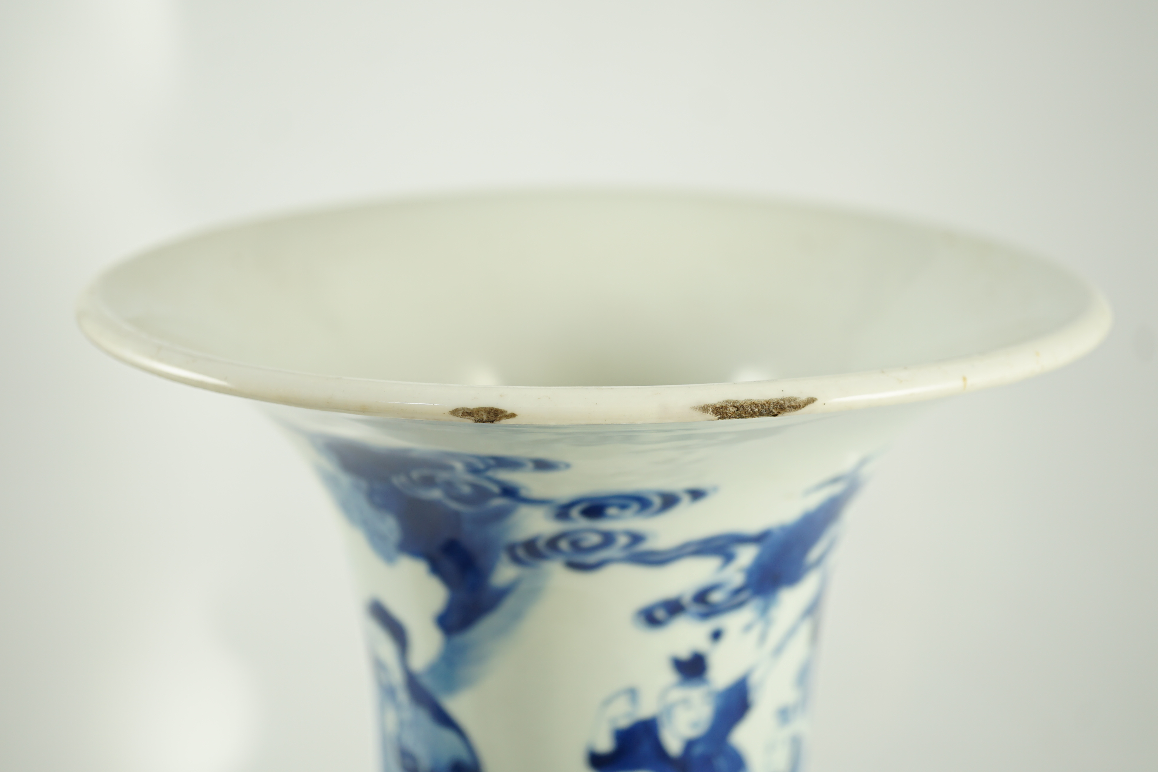 A Chinese blue and white ‘Daoist immortals’ yen-yen vase, Kangxi period, glaze losses to rim and edge of foot
